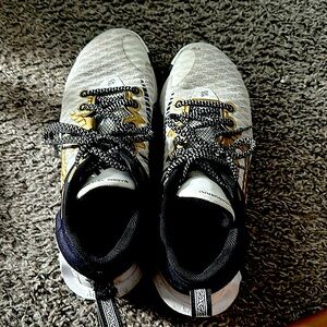 Men’s Basketball shoes, back tag is torn but can easily be sewed back!